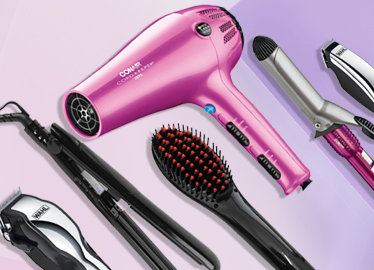 Pirture of hair dryer, brushes and hair tools. 